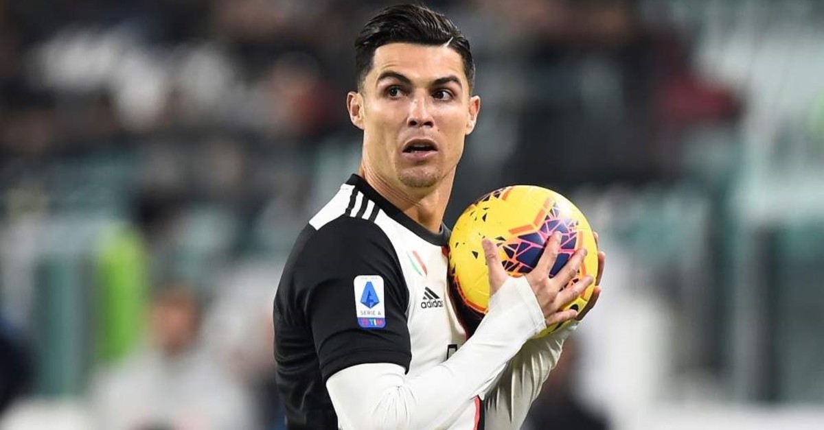 Cristiano Ronaldo holds the ball during the match against AC Milan, Turin, Nov. 10, 2019. (REUTERS Photo)    