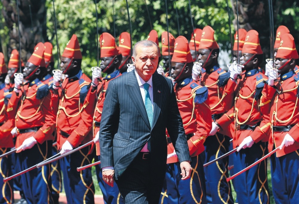 President Erdou011fan at the Palace of the Republic in Dakar, Senegal, during an official ceremony where he was welcomed by Senegal's President Macky Sall, March 2.