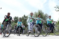 Cyclists tour around Eymir Lake, June 3, 2019.
