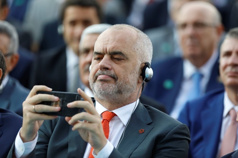 Albanian Prime Minister Edi Rama takes photograph as he attends a ceremony for Erdoğan, in Ankara, Turkey, Monday, July 9, 2018.