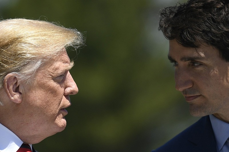 US President Donald J. Trump (L) meets Canada's Prime Minister Justin Trudeau (R) at the Welcome Ceremony at the G7 summit in Charlevoix in Canada, June 8, 2018. (EPA Photo)