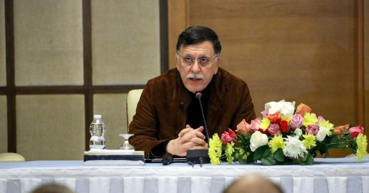 Fayez al-Sarraj, head of Libya's Government of National Accord (GNA), and the head of Libya's Supreme Council of State attend a press conference, Tripoli, Jan.15, 2020. (AFP PHOTO)