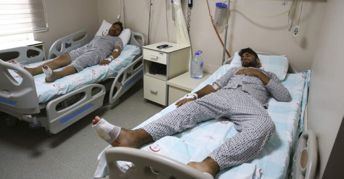 Pakistani migrants receive treatment in hospital in Edirne, Turkey, after being beaten and forced back across the border by Greek soldiers. (AA Photo)