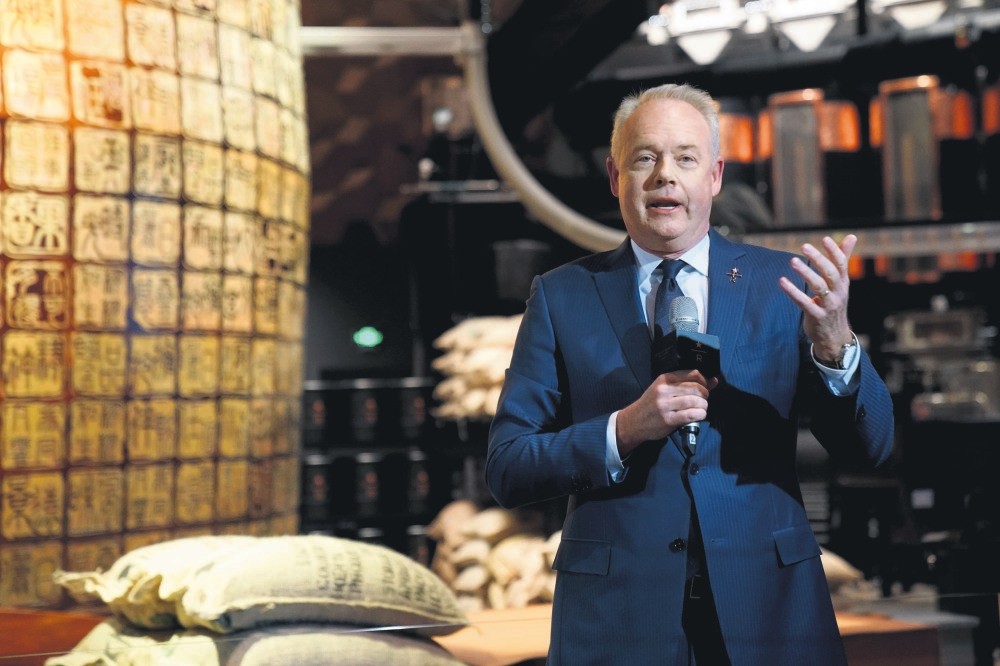 Starbucks CEO Kevin Johnson attends a press conference at the new Starbucks Reserve Roastery, Shanghai.