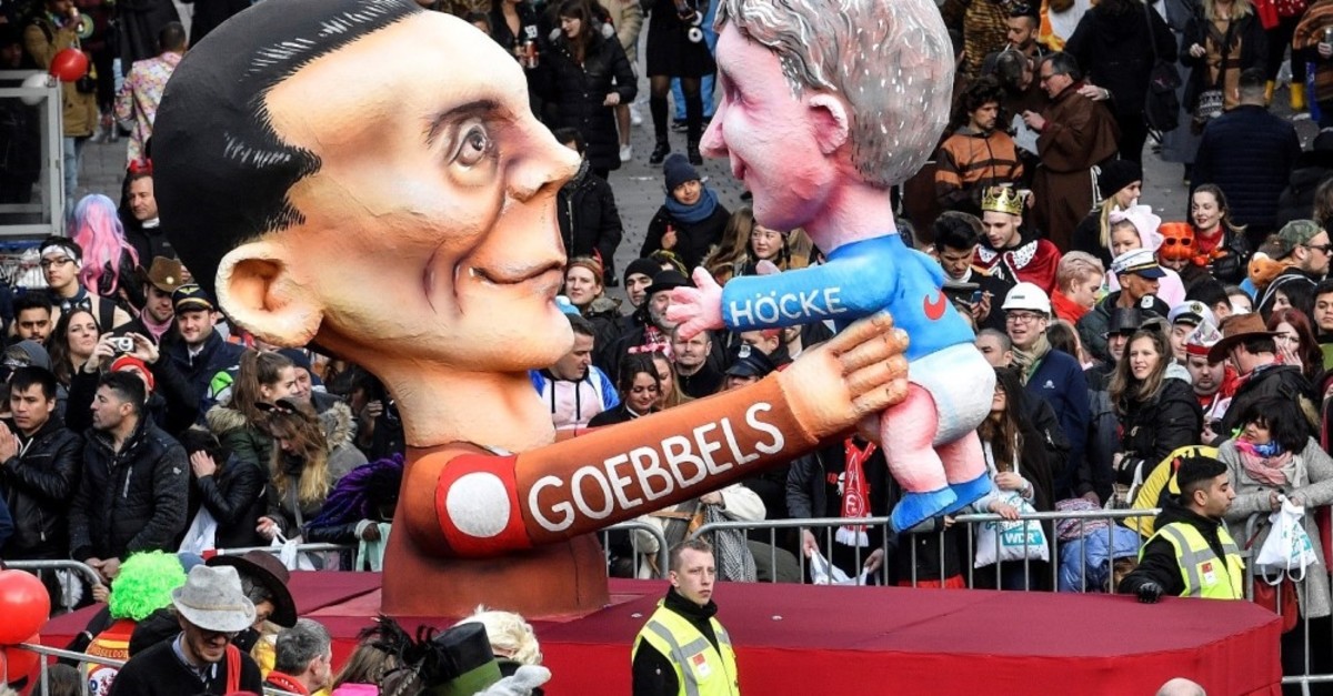 A carnival float depicts Nazi propaganda minister Joseph Goebbels holding right-wing AfD politician Bjoern Hoecke during the traditional carnival parade in Duesseldorf, Germany, March 4, 2019.