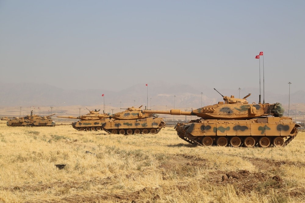 Turkish tanks are seen near the Habur border gate between Turkey and Iraq during a military drill, Sept. 18.