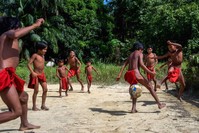 Waiapi boys play football in the Manilha village.