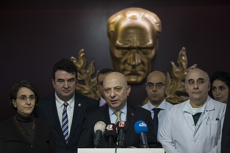  Ankara University rector Erkan Ibis (center) holding news conference after Baykal left for Germany, Dec. 5, 2017  (AA Photo)