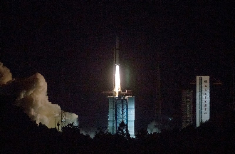 In this photo provided by China's official Xinhua News Agency, a Long March-4C rocket carrying a relay satellite, named Queqiao (Magpie Bridge), is launched from southwest China's Xichang Satellite Launch Center, Monday, May 21, 2018 (AP Photo)