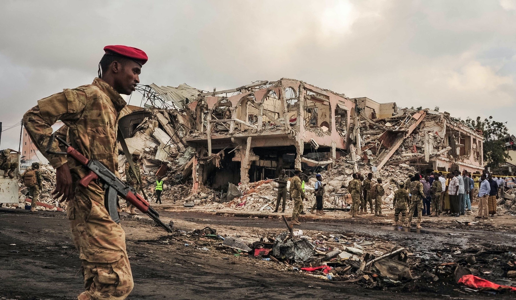 Somali soldiers patrol on the scene of a truck bomb explosu0131on in Mogadishu on October 15, 2017.