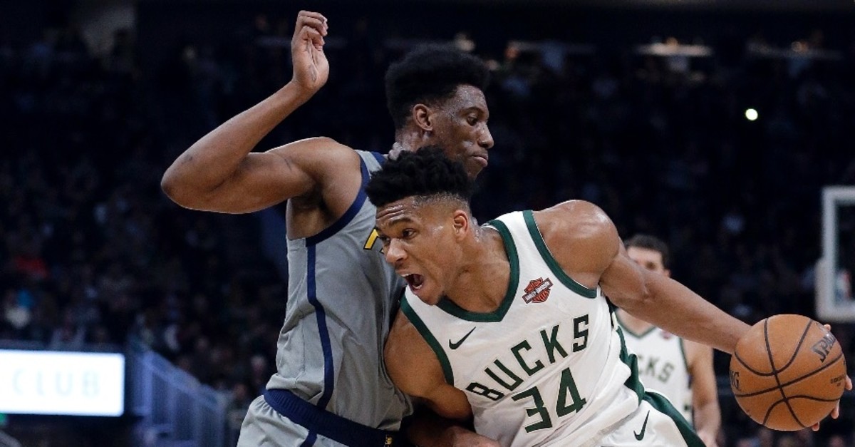 Milwaukee Bucksu2019 Giannis Antetokounmpo (34) drives to the basket against Indiana Pacersu2019 Thaddeus Young during the second half of their matchup in Milwaukee, March 7, 2019.