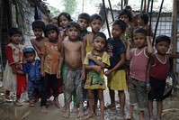 A group of Rohingya refugee children stand at a makeshift camp in Teknaf, Cox's Bazar, Aug. 24.