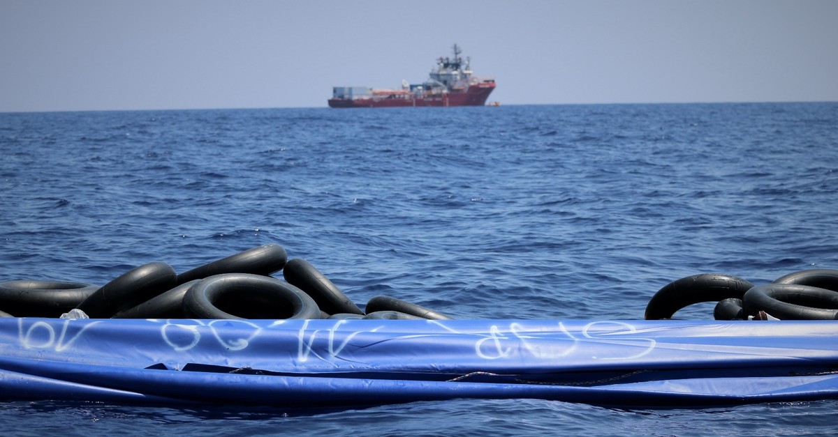 The migrant rescue ship Ocean Viking floats in the distance, as it waits in international waters between August 9 and 12, 2019. 