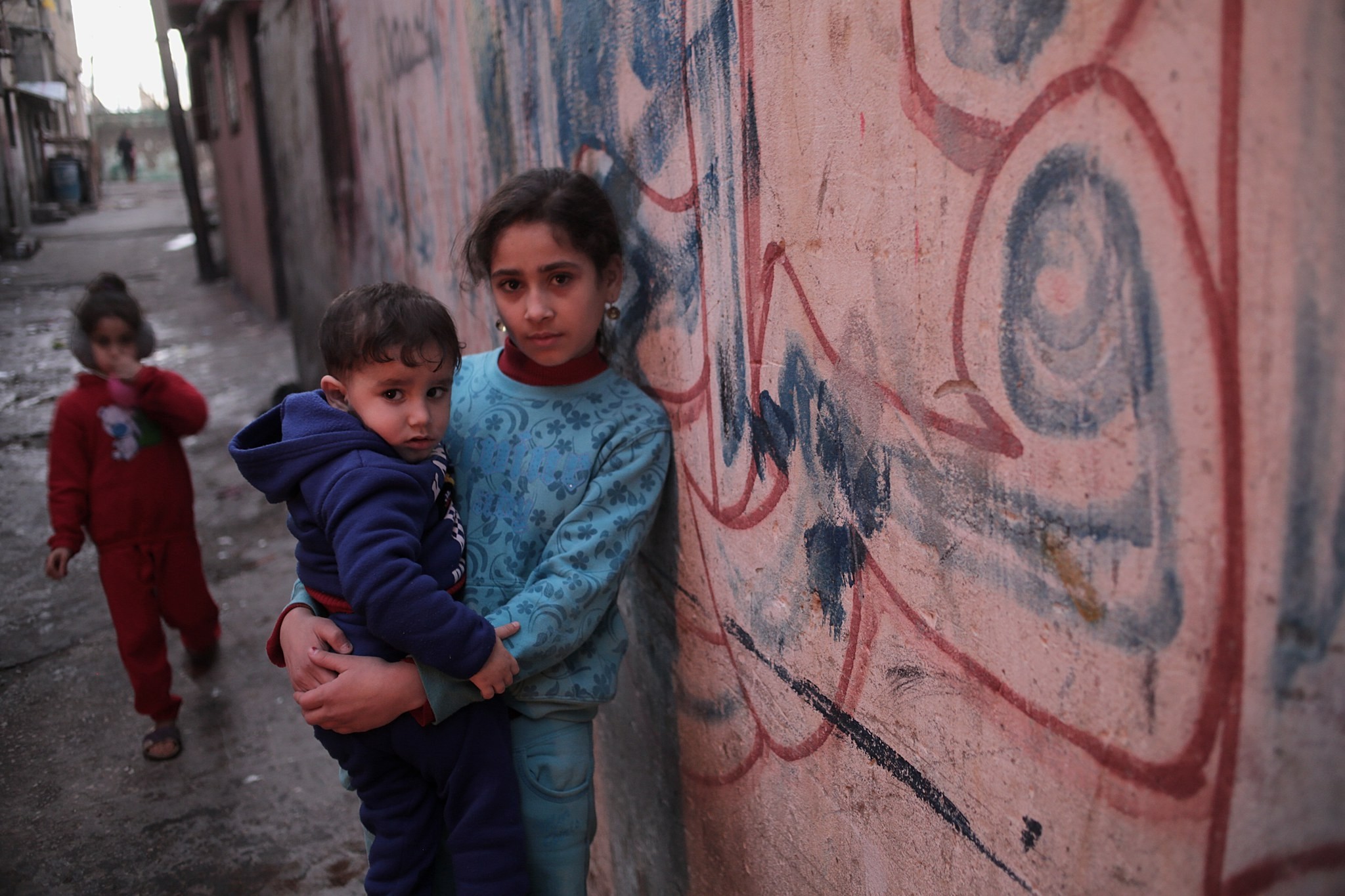 Palestinian refugees children play in the streets of al Shateaa refugee camp west northern Gaza City on January 17, 2018. (EPA Photo)