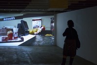 In u201cFlooded McDonaldu2019s,u201d we see hamburgers, french fries, coke, toys floating, passing by camera, as well as the restaurantu2019s furniture. Towards the end, when everything is submerged and image of video becomes blurry, everything becomes obscured. 