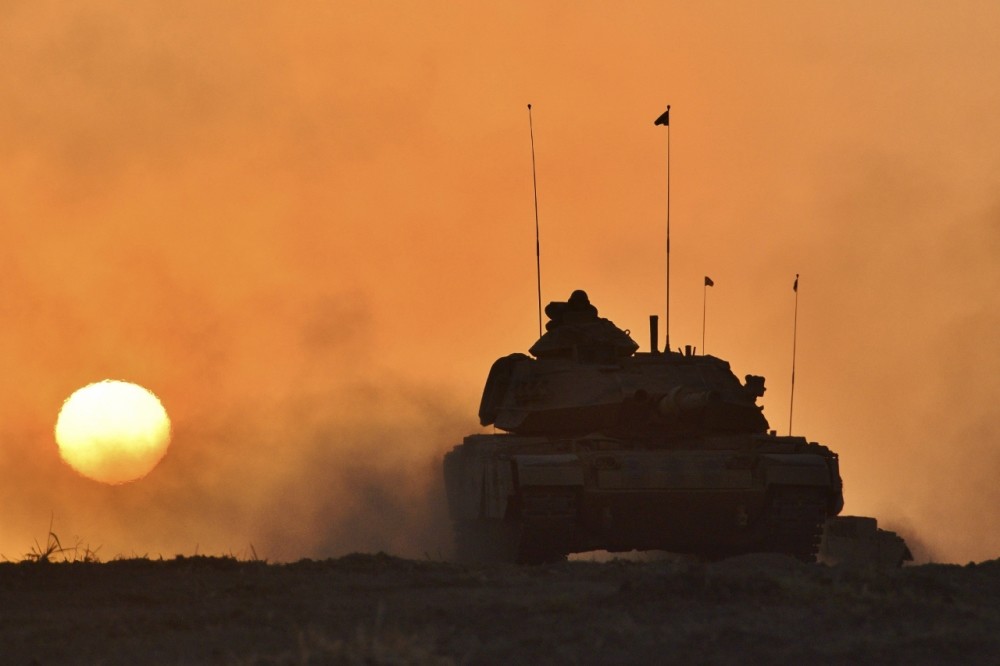 A Turkish army tank advances in Silopi near the Habur border gate with Iraq during a military exercise in southeastern Turkey on Sept. 29.