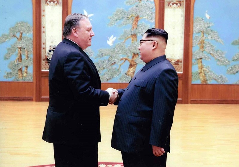  In this file photo released by the US Government on April 26, 2018, North Korean leader Kim Jong-Un (R) shakes hands with the former CIA Director, now US Secretary of State, Mike Pompeo (AFP Photo)