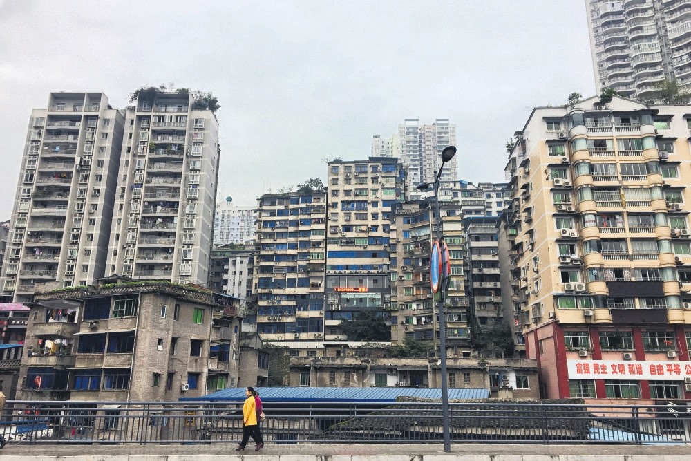Residential buildings are seen in Zhongxian, Chongqing., whose government has a plan to reinvent its economy with a $211.6 million online gaming complex that it hopes will cash in on China's fast-growing e-sports market.