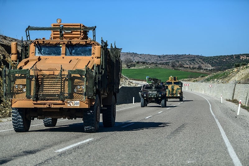 A Turkish military convoy transports soldiers to the Turkish border on Jan. 31, 2018. (AFP Photo)
