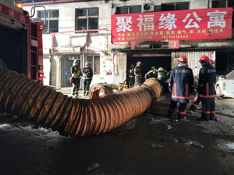 Firefighters work at the site of a house fire, in Daxing district, Beijing, China early November 19, 2017. (Reuters Photo)