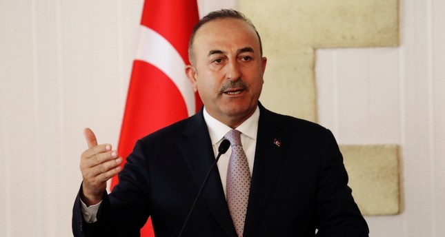 Foreign Minister Mevlüt Çavuşoğlu talks at a press conference during a visit in the Turkish Republic of Northern Cyprus, in the city of Lefkoşa, July 24, 2018. (REUTERS Photo)