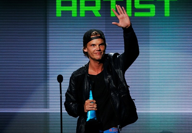 Avicii accepts the favorite electronic dance music artist award at the 41st American Music Awards in Los Angeles, California (Reuters File Photo)