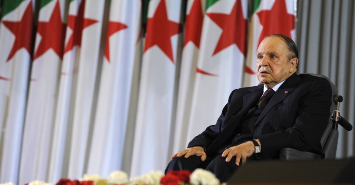 In this April 28, 2014 file photo, Algerian President Abdelaziz Bouteflika sits in a wheelchair after taking oath as President, in Algiers. (AP Photo)