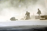 Security forces run from the site of a suicide attack after the second bombing in Kabul, Afghanistan, Monday, April 30, 2018 (AP Photo)