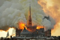 In this image made available on Tuesday April 16, 2019 flames and smoke rise from the blaze at Notre Dame cathedral in Paris, Monday, April 15, 2019. (AP Photo)