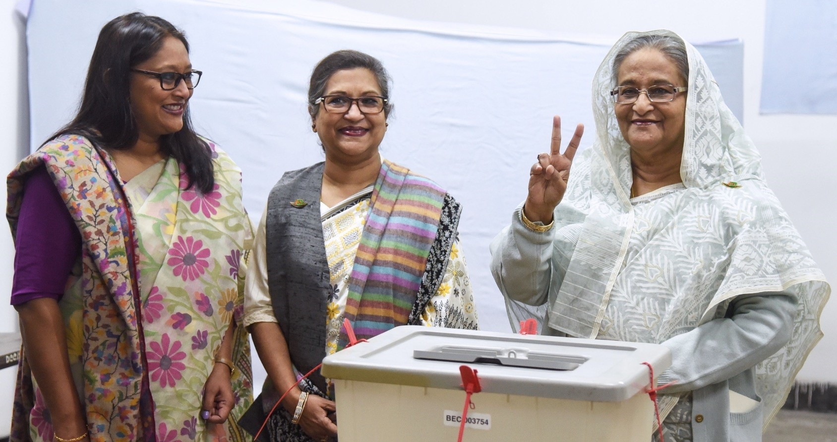 Bangladeshi Prime Minister Sheikh Hasina flashes the peace sign after casting her vote at a polling station, Dhaka, Dec. 30.