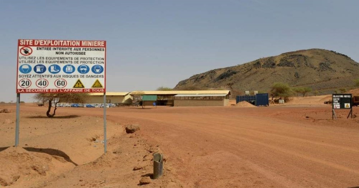 A sign is posted at the entrance of the Tambao mine in Tambao, 350 kilometers northeast of the capital, Ouagadougou on April 5, 2015, where five armed men kidnapped a Romanian mineworker the day before. (AFP)