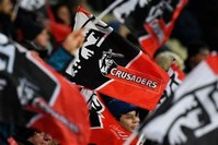 Crusaders fans celebrate during a match at their home stadium in Christchurch. (AFP Photo)