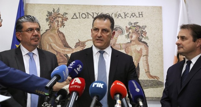 Greek Cypriot Minister of Energy, Yiorgos Lakkotrypis, speaks during a news conference while Tristan Aspray, ExxonMobil's Vice President of Exploration for Europe, Russia and the Caspian, looks on in Nicosia, Feb. 28, 2019. (Reuters Photo)