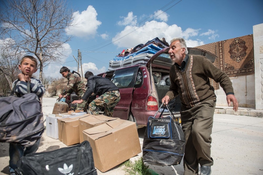 Members of the Khalil family returning to al-Bab as reconstruction process continue. (AA Photo)