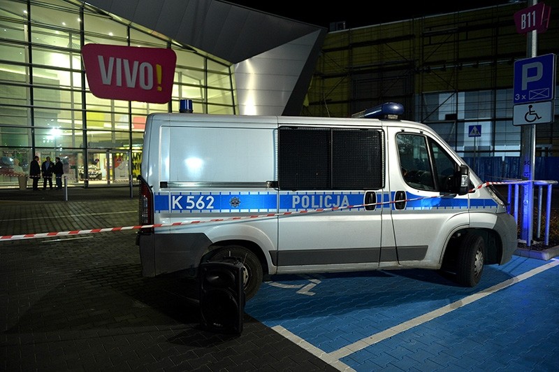 A police van is parked in front of the shopping mall after a knife attack, in Stalowa Wola, Poland, 20 October 2017. (EPA Photo)