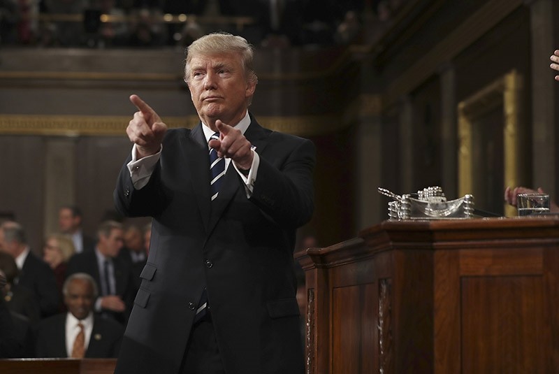 US President Donald J. Trump reacts after delivering his first address to a joint session of Congress from the floor of the House of Representatives in Washington, DC, USA on Feb. 28, 2017. (EPA Photo)