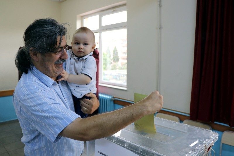 Polls open in Turkey's presidential and parliamentary elections