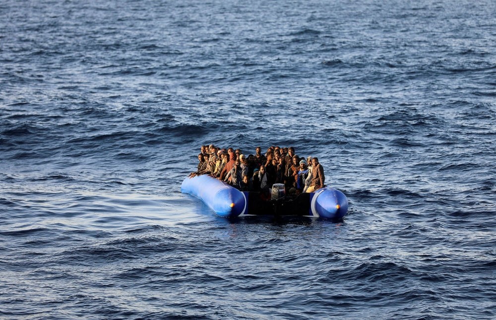 Migrants in a raft were rescued by the Libyan coast guards off the coast of Garabulli, Libya, Jan. 8.