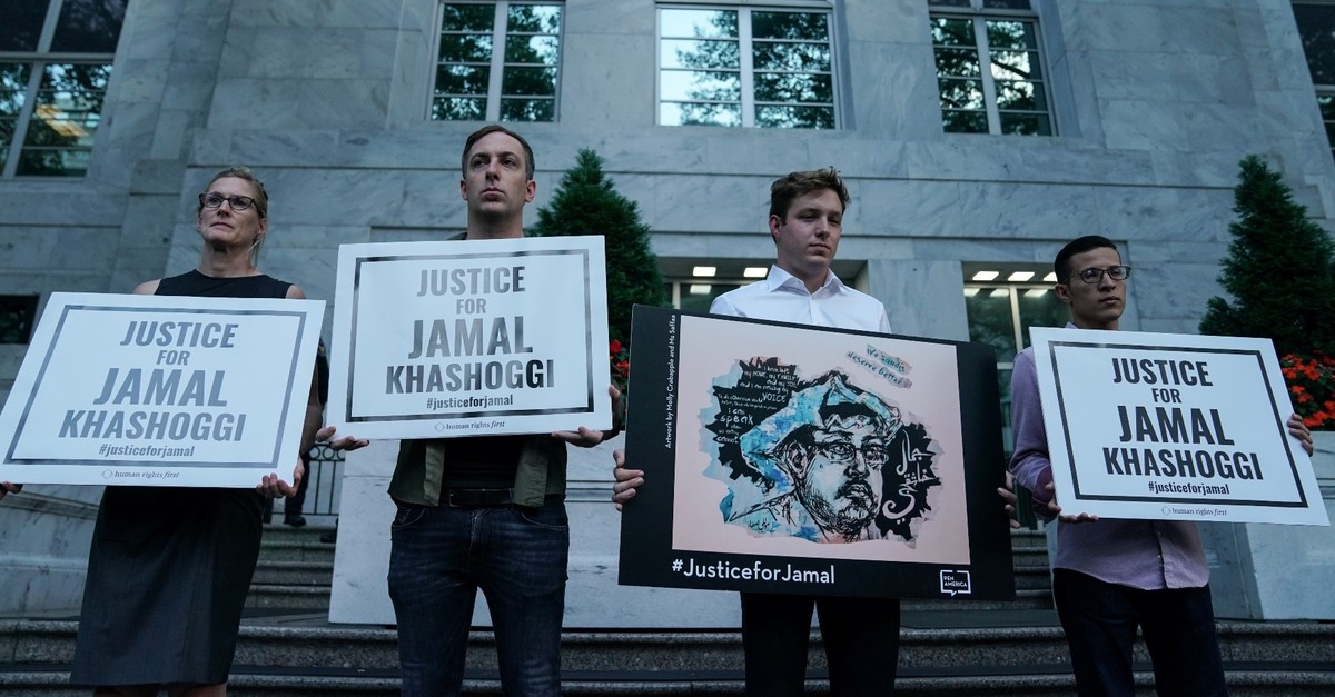 The Committee to Protect Journalists and other press freedom activists hold a candlelight vigil in front of the Saudi Embassy in Washington, U.S. to mark the anniversary of the killing of journalist Jamal Khashoggi, Oct. 2, 2019.