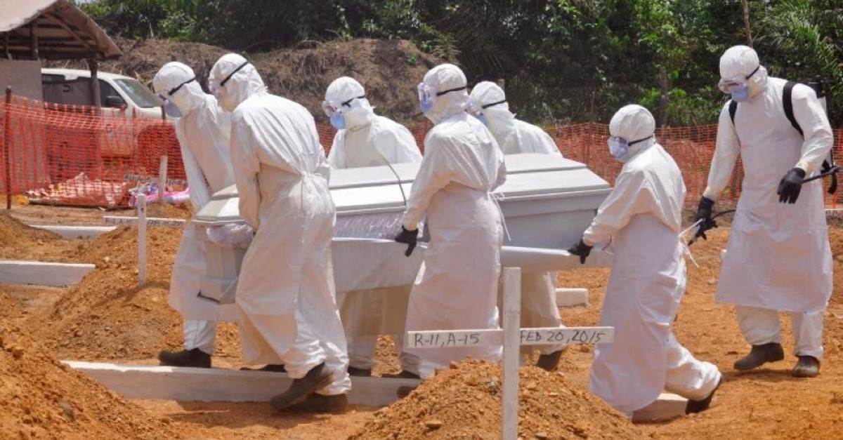 In this file photo, health workers carry the body of a person who they suspecteded died from the Ebola virus, Monrovia, Liberia, Wednesday, March 11, 2015  (AP Photo)