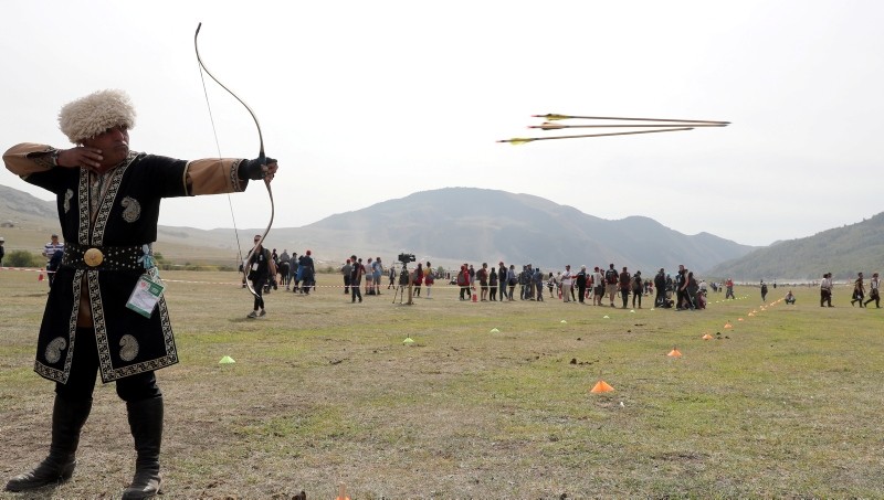 People take part in an archery event during the 3rd World Nomad Games at Issyk-Kul lake in gorge 'Kyrchyn', 300km from Bishkek, Kyrgyzstan, September 6, 2018. (EPA Photo)