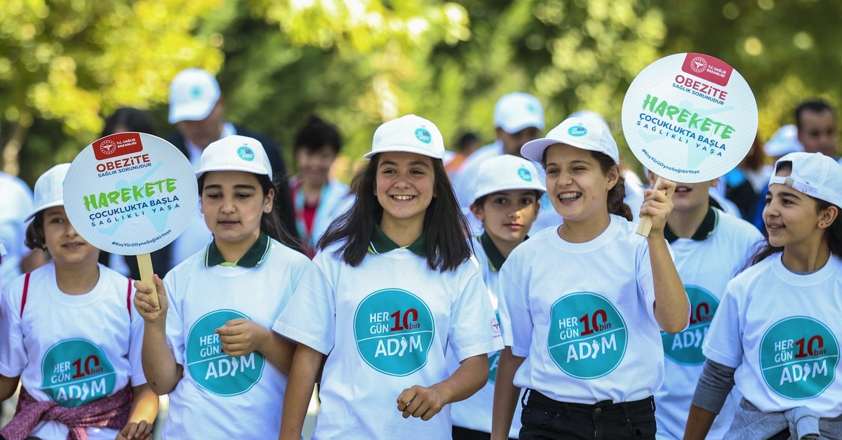 Children walk in the capital Ankara as part of nationwide events, Oct. 3, 2019.