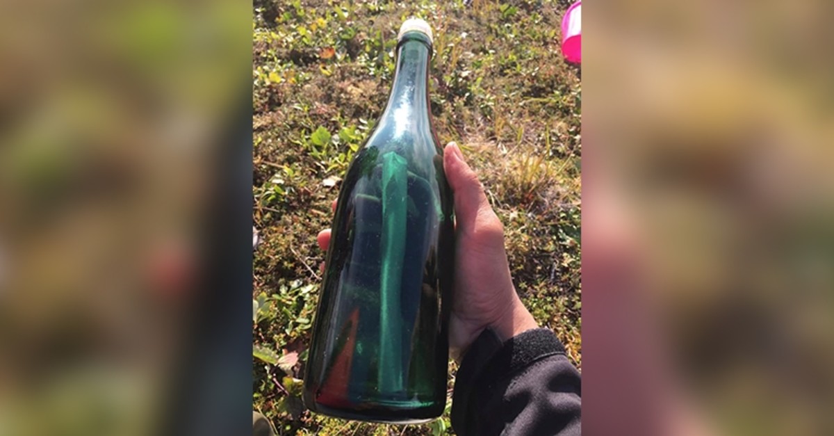 This undated photo provided by Tyler Ivanoff shows a bottle with a message that he found on the shores of western Alaska. (AP Photo)