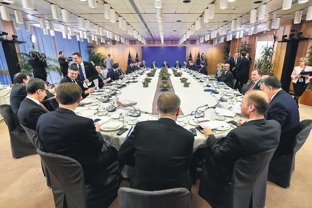 European Union heads of state attend a breakfast meeting at an EU summit in Brussels, Friday, Dec. 15.