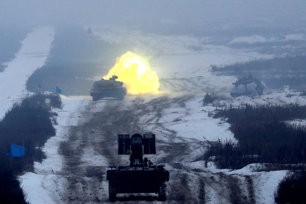 A tank fires during military exercises at the Ukrainian Ground Forces training center near Honcharivske in the Chernihiv region, Ukraine, Dec. 3.