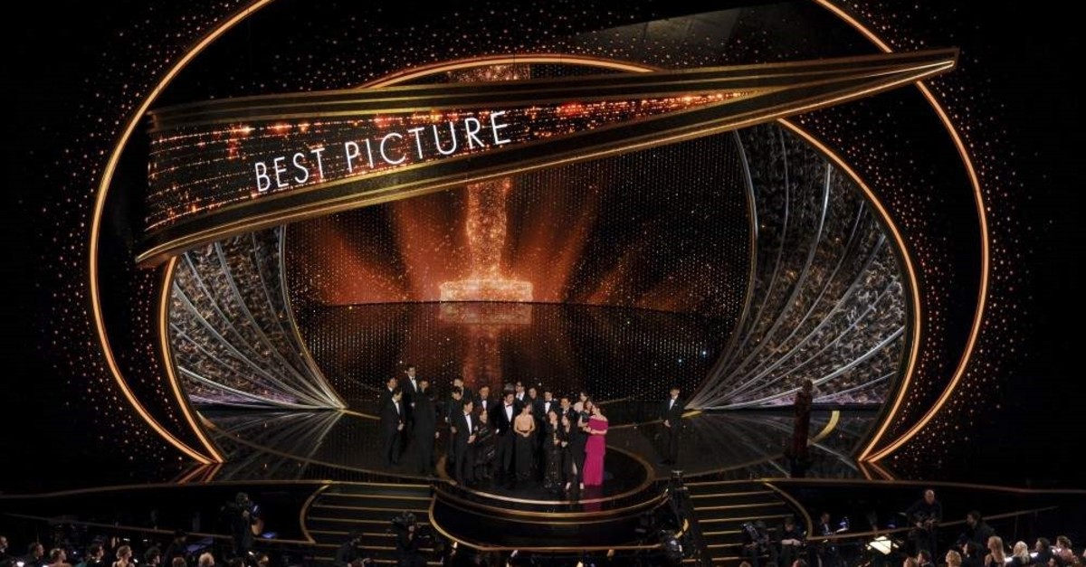 The cast and crew of ,Parasite, accept the award for best picture at the Oscars on Sunday, Feb. 9, 2020, at the Dolby Theatre in Los Angeles. (AP Photo)