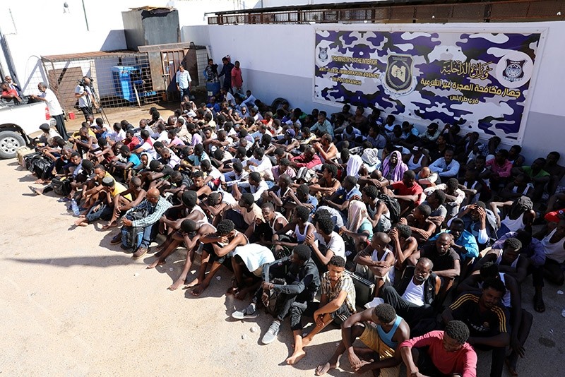 Sudanese migrants sit at a detention center before their voluntary return to their country, in Tripoli, Libya September 14, 2017. (Reuters Photo)