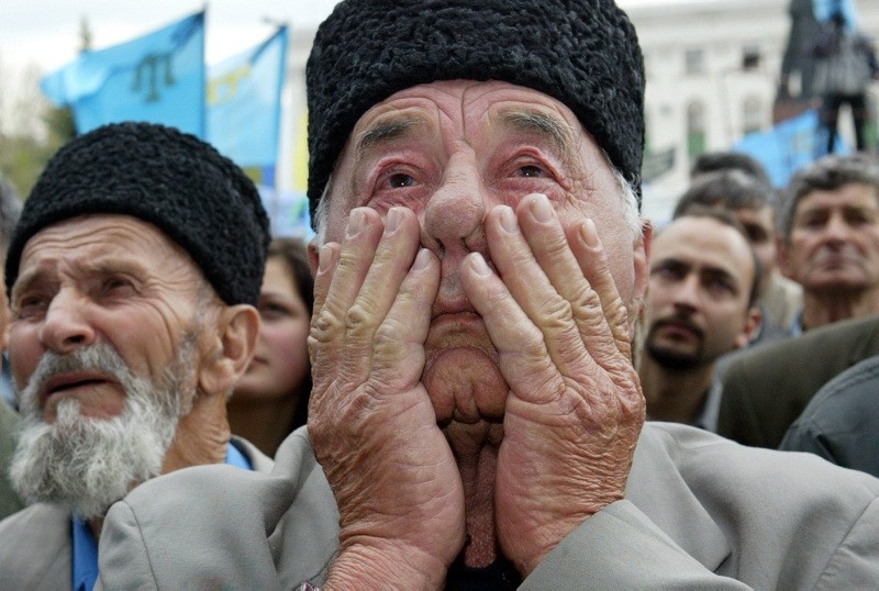 This May 18, 2004 file photo shows a Crimean Tatar man attending a mass rally held on the 60th anniversary of the deportation of the Crimean Tatar people from Crimea. (AFP Photo)