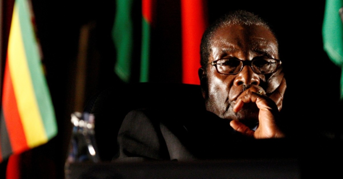 Zimbabwean President Robert Mugabe watches a video presentation during the summit of the Southern African Development Community (SADC) in Johannesburg, August 17, 2008. (Reuters Photo)