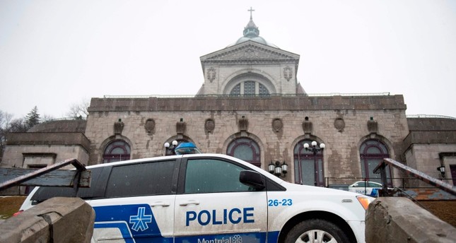 Police provide security at Saint Joseph's Oratory in Montreal on March 22, 2019, after Catholic Priest Claude Grou was stabbed during a livestreamed morning mass (AFP Photo)